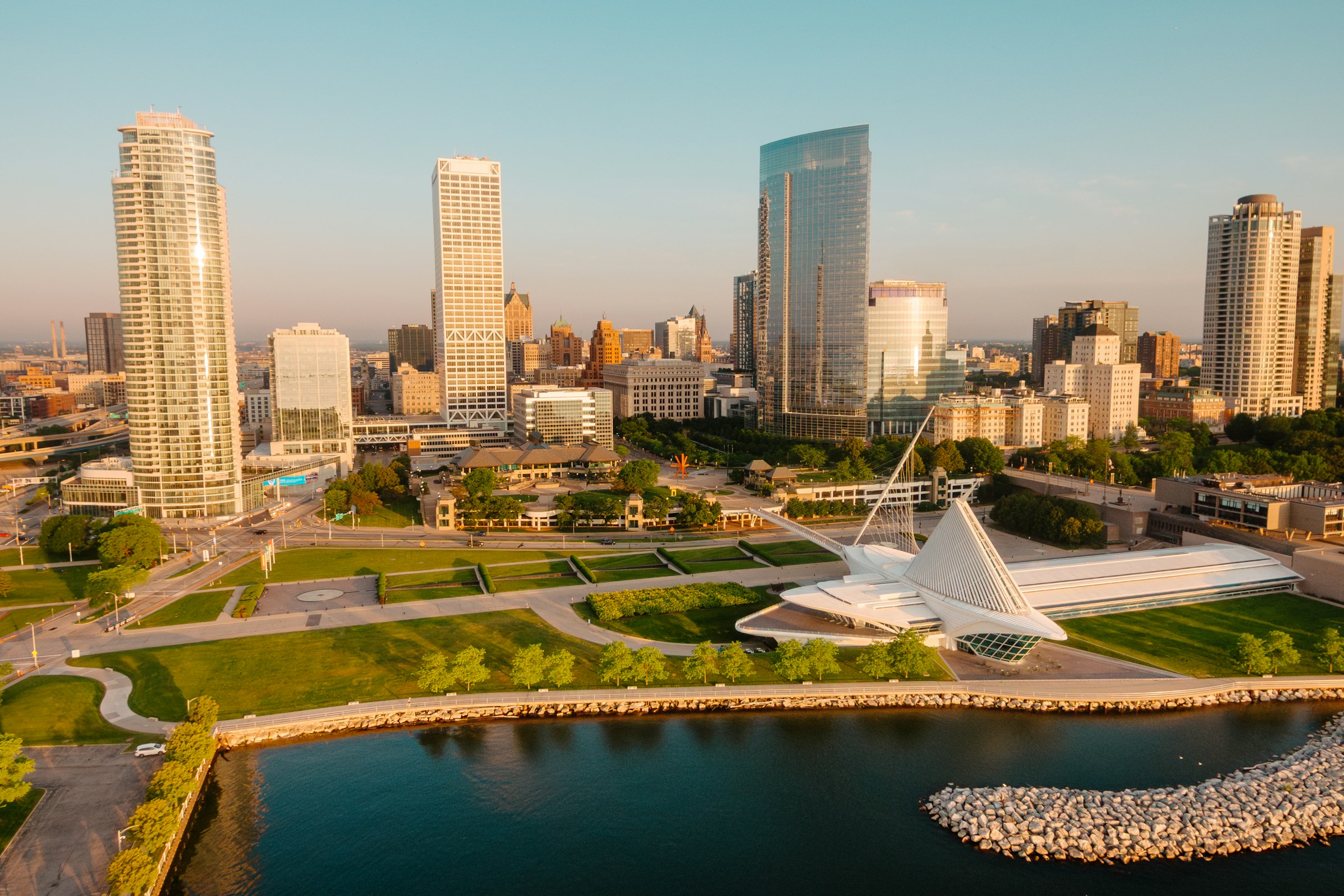 Milwaukee skyline rising above the lakefront at sunrise